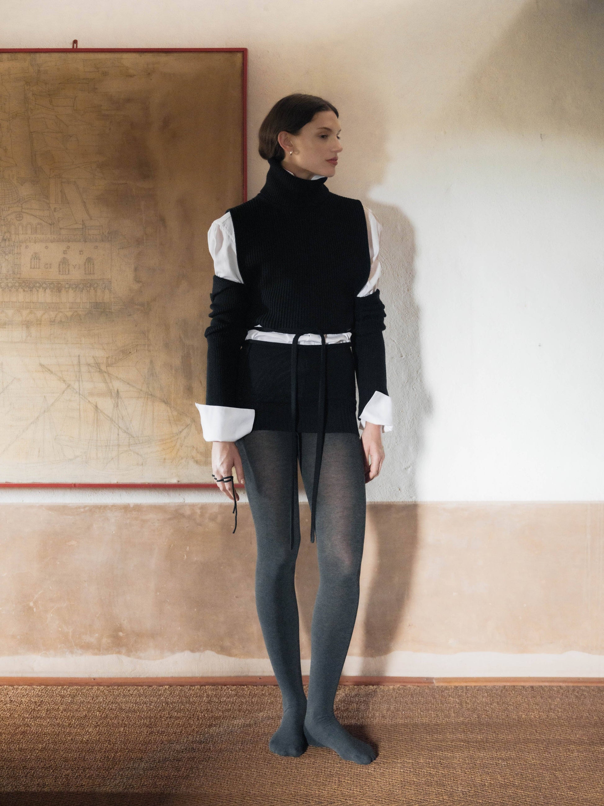 Scaldabraccia in lana merino extra fine con fasce lunghe