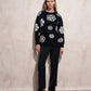 Maglione donna nero con maxi fiori a contrasto