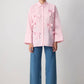 Camicia oversize in cotone a righe rosa con fiocchi