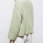 Maglione a trecce con collo alto
