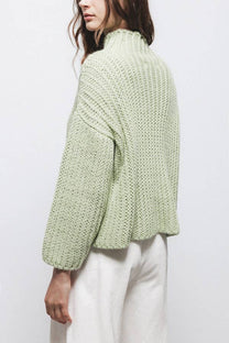 Maglione a trecce con collo alto