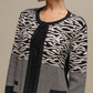 Cardigan donna in maglia jacquard animalier bicolore