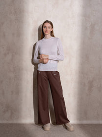 Maglione in maglia con collo alto e volant