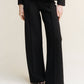 Pantaloni bootcut in lana merino