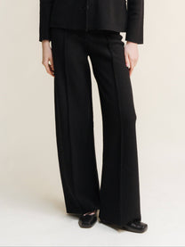 Pantaloni bootcut in lana merino