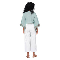 Top estivo boho in cotone verde con laccio