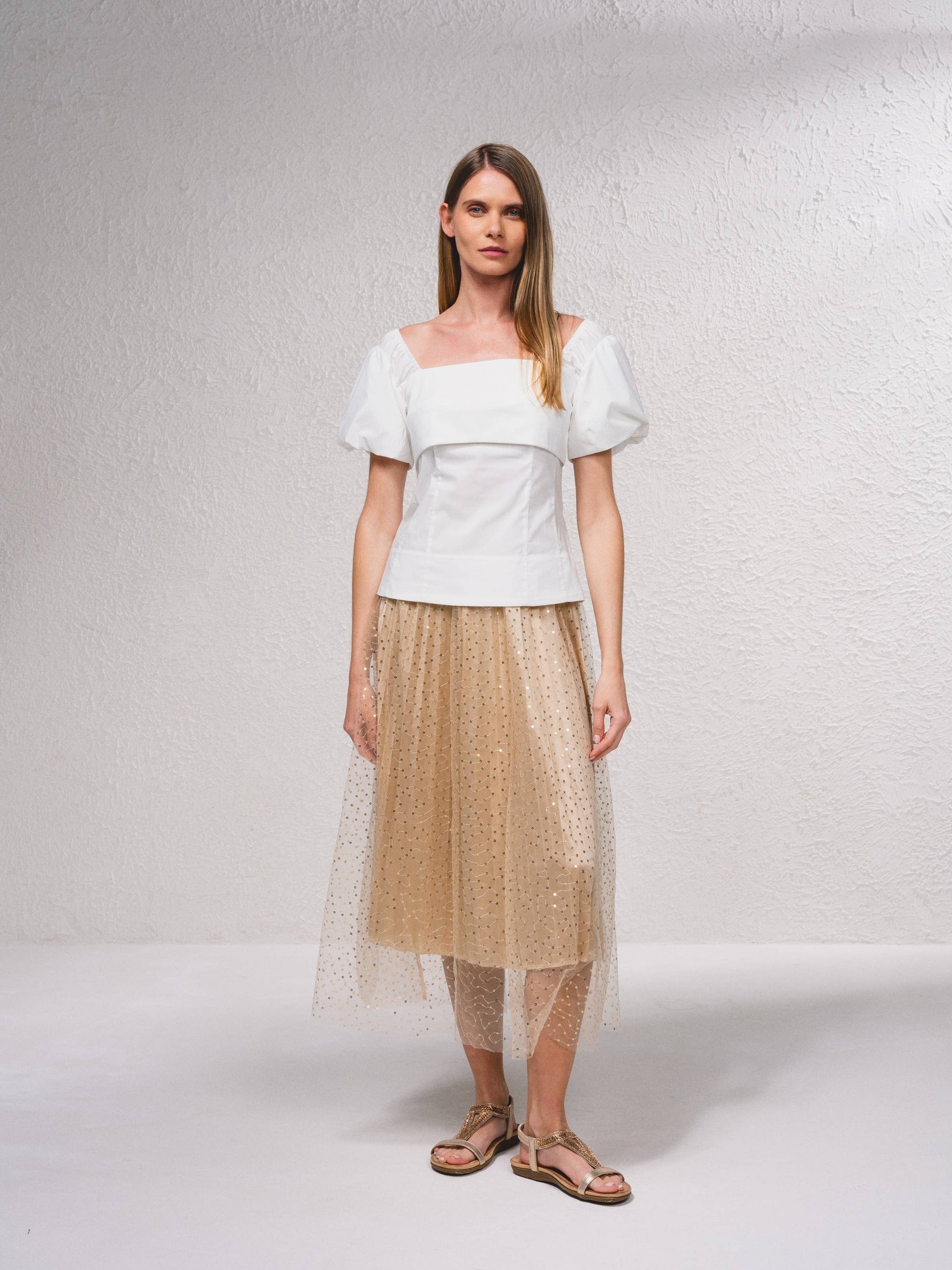 Blusa con scollo quadrato e maniche a sbuffo