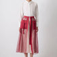 Gonna midi in organza con tasche oversize e cintura