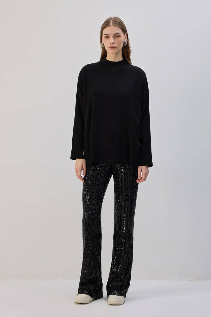 Pantaloni a zampa con paillettes