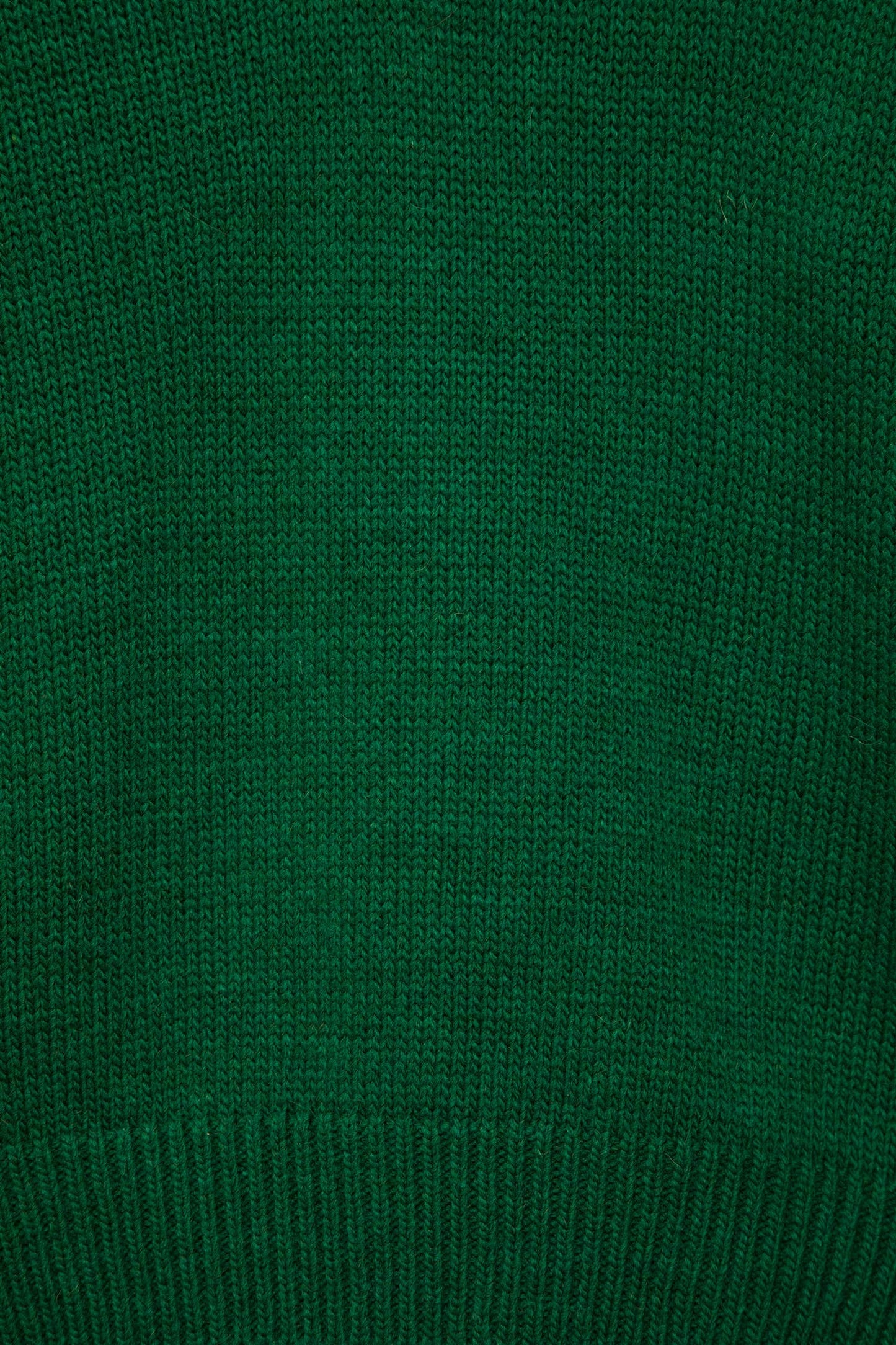 Maglione verde a maglia rasata con scollo a V