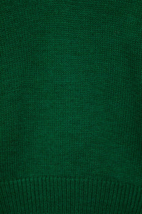 Maglione verde a maglia rasata con scollo a V