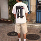 T-shirt oversize bianca con stampa gatto