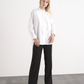 Camicia bianca in cotone con bottone a cuore