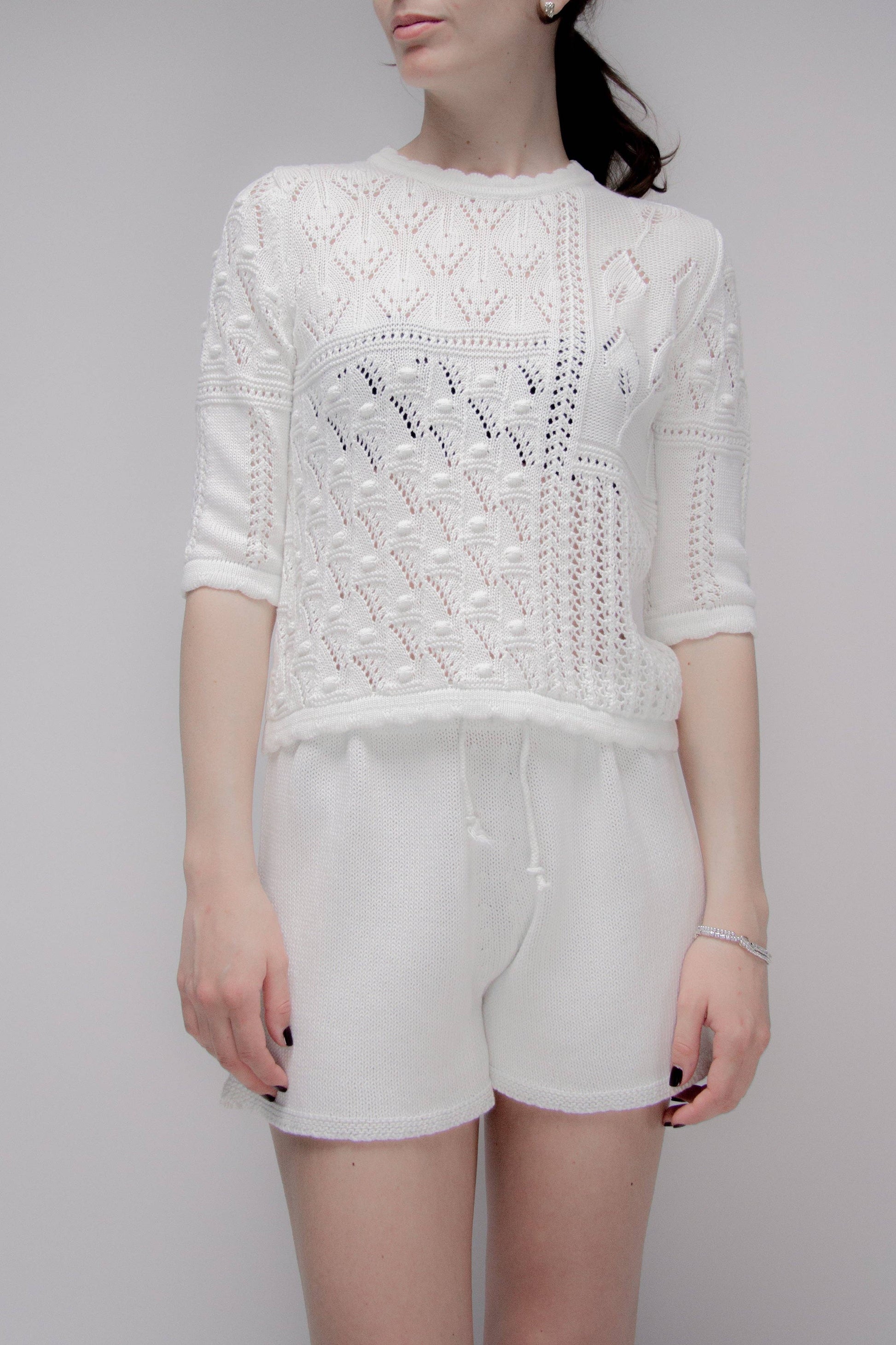 Maglia traforata in cotone con motivo floreale
