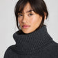 Maglione dolcevita oversize in lana d’agnello grigio scuro mélange