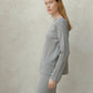 Maglione in lana merino extrafine con scollo a barchetta a maglia 3D
