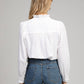 Camicia bianca con rouches e collo alto