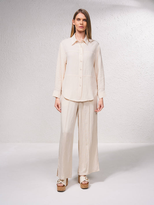 Camicetta oversize con bottoni frontali e colletto classico