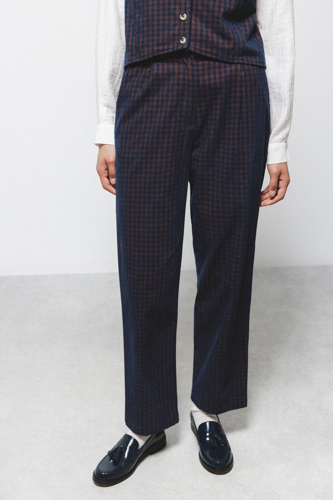 Pantaloni aderenti a quadri in cotone