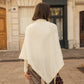 Poncho a coste con scollo a V