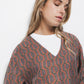 Blusa geometrica con scollo a V