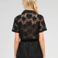 Camicia in pizzo nero con colletto e maniche corte