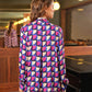 Blusa in viscosa con fibbia e stampa geometrica