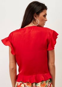 Top incrociato rosso con volant