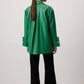 Camicia in pelle sintetica con polsini ampi