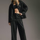 Pantaloni in paillettes neri a gamba ampia