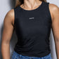 Top nero antimacchia in lycra