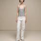 Canotta in maglia lurex versatile con scollo a V
