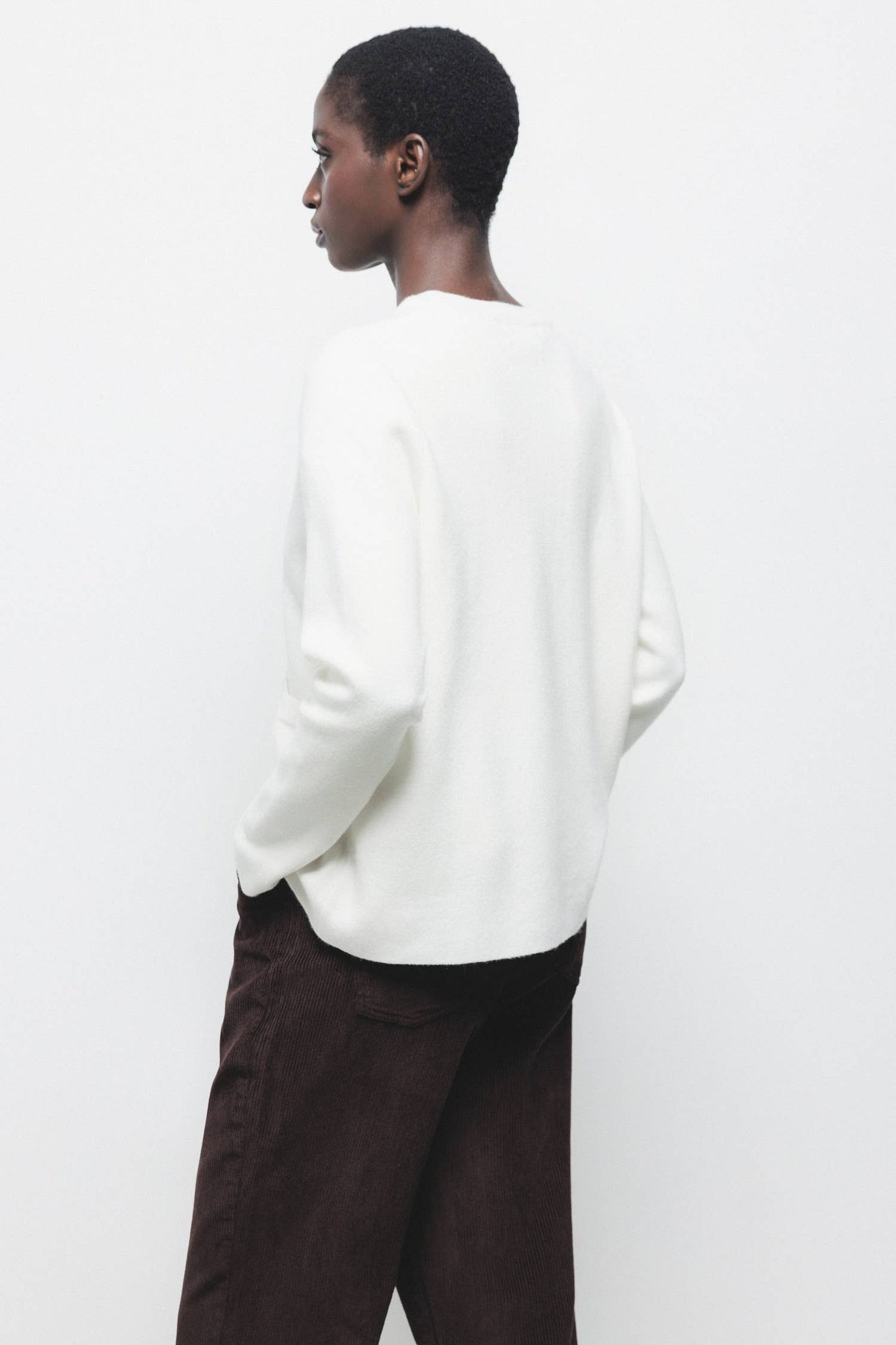 Cappotto cardigan in maglia rasata con bottoni e tasche