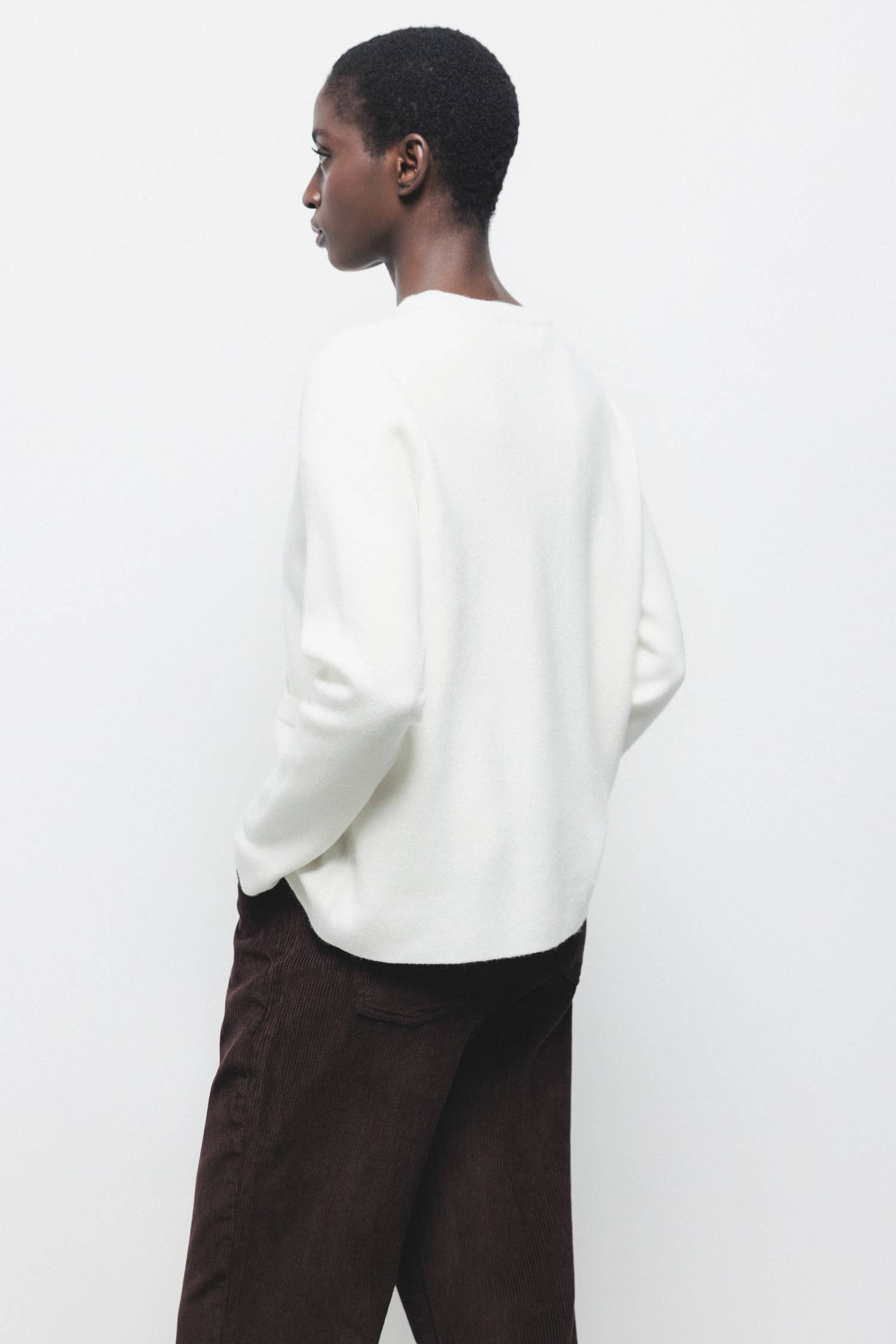 Cappotto cardigan in maglia rasata con bottoni e tasche