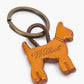 Portachiavi in pelle a forma di cane con logo inciso