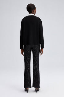 Cardigan nero in maglia con bottoni dorati