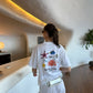 T-shirt oversize “Extinction is Forever” in cotone biologico
