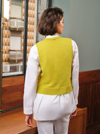 Gilet elegante in maglia con bottoni gioiello