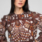 Blusa in organza stampata caramello