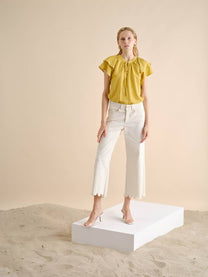 Blusa in lino con volant