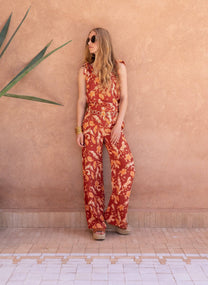 Pantaloni a vita alta terracotta con stampa frecce