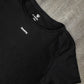 Top corto nero antimacchia in lycra