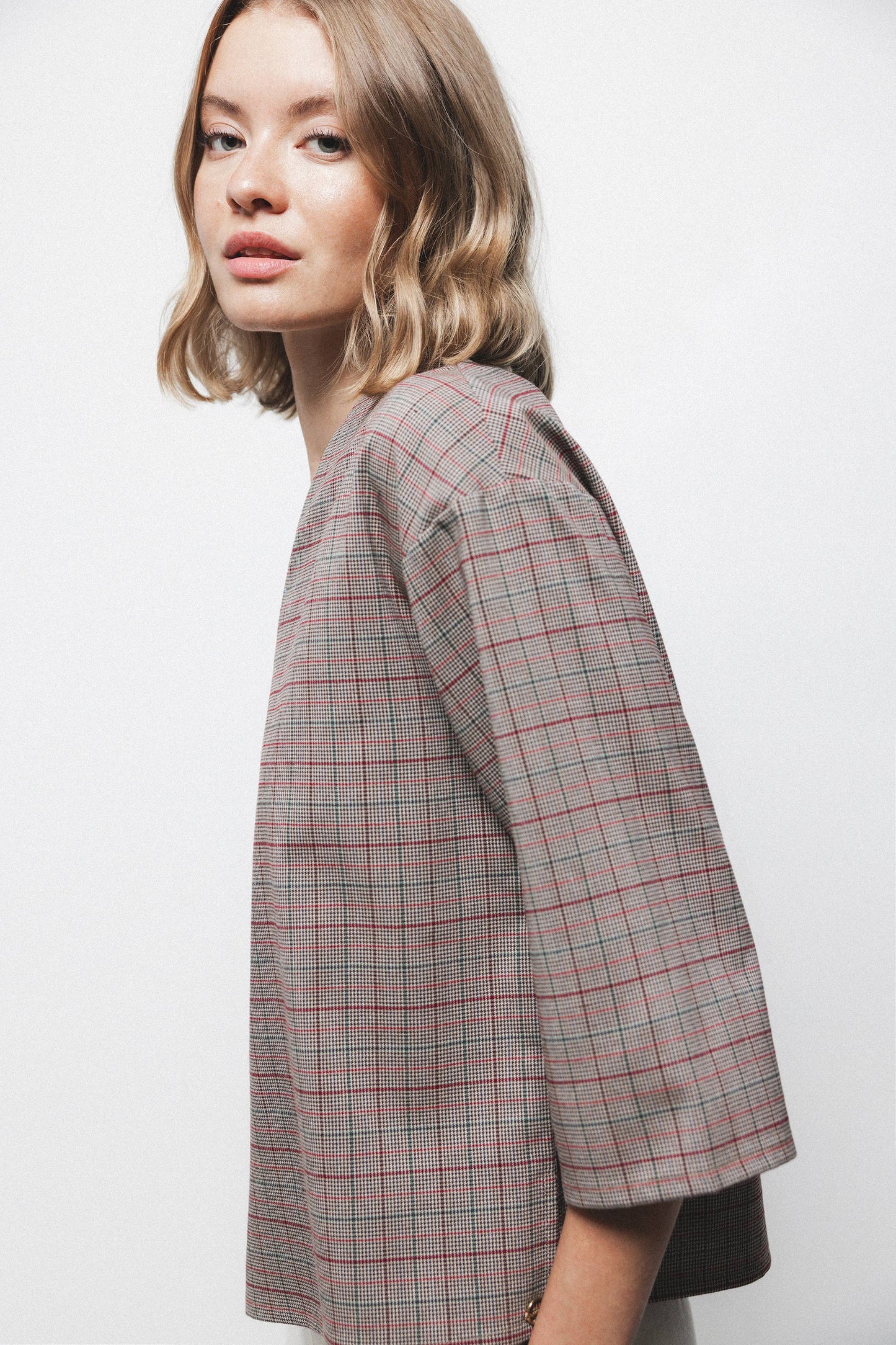 Blusa Principe di Galles con scollo a V