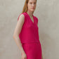 Top smanicato in misto cashmere con scollo a V