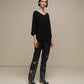 Maglione oversize con scollo a V e bottoni gioiello