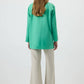 Camicia verde con dettagli gioiello