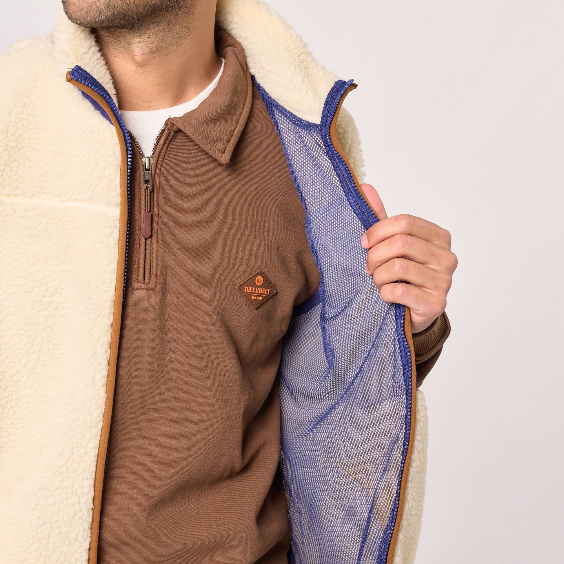Gilet sherpa unisex con zip avorio e blu