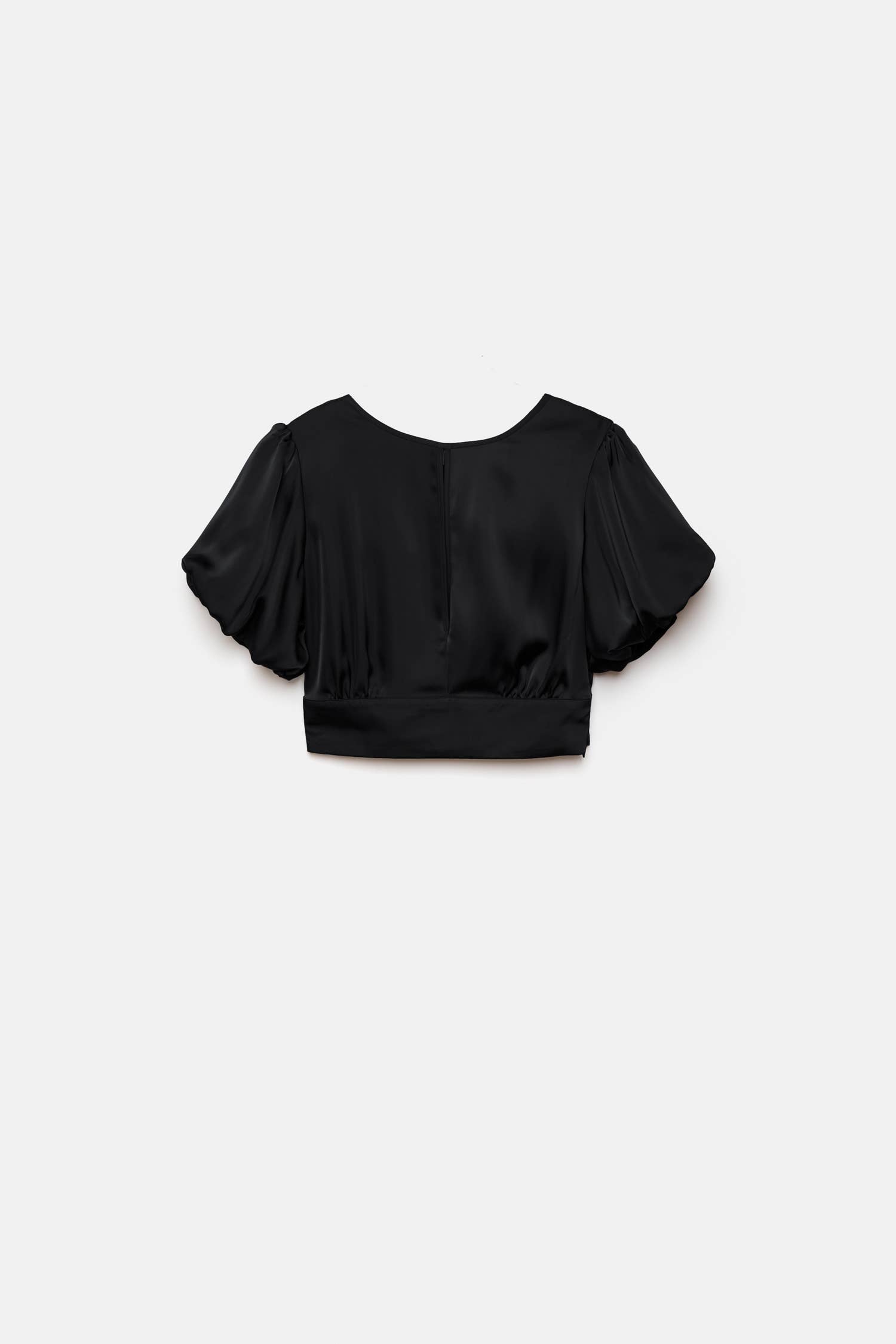 Top crop con maniche a palloncino e fiocco sul retro